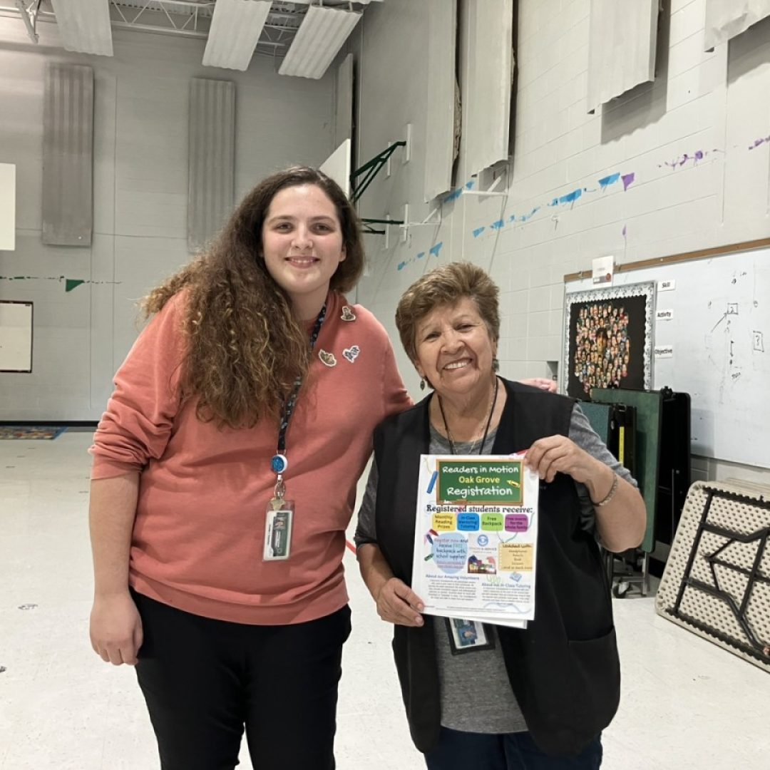 Seniors in Service Classroom Grandparent volunteer with teacher.