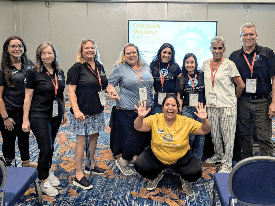 Seniors in Service team members pose at the 2024 AmeriCorps Seniors Convening after presenting volunteer recruitment and engagement strategies.