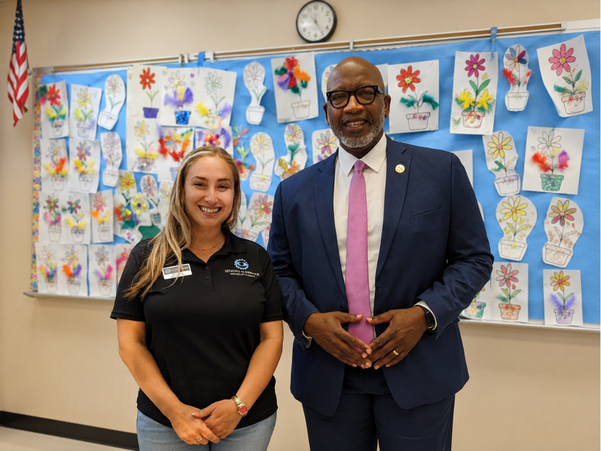 Seniors in Service Health Buddies Program Manager Aria Garling stands with a community leader after her appointment to the St. Petersburg Commission on Aging.