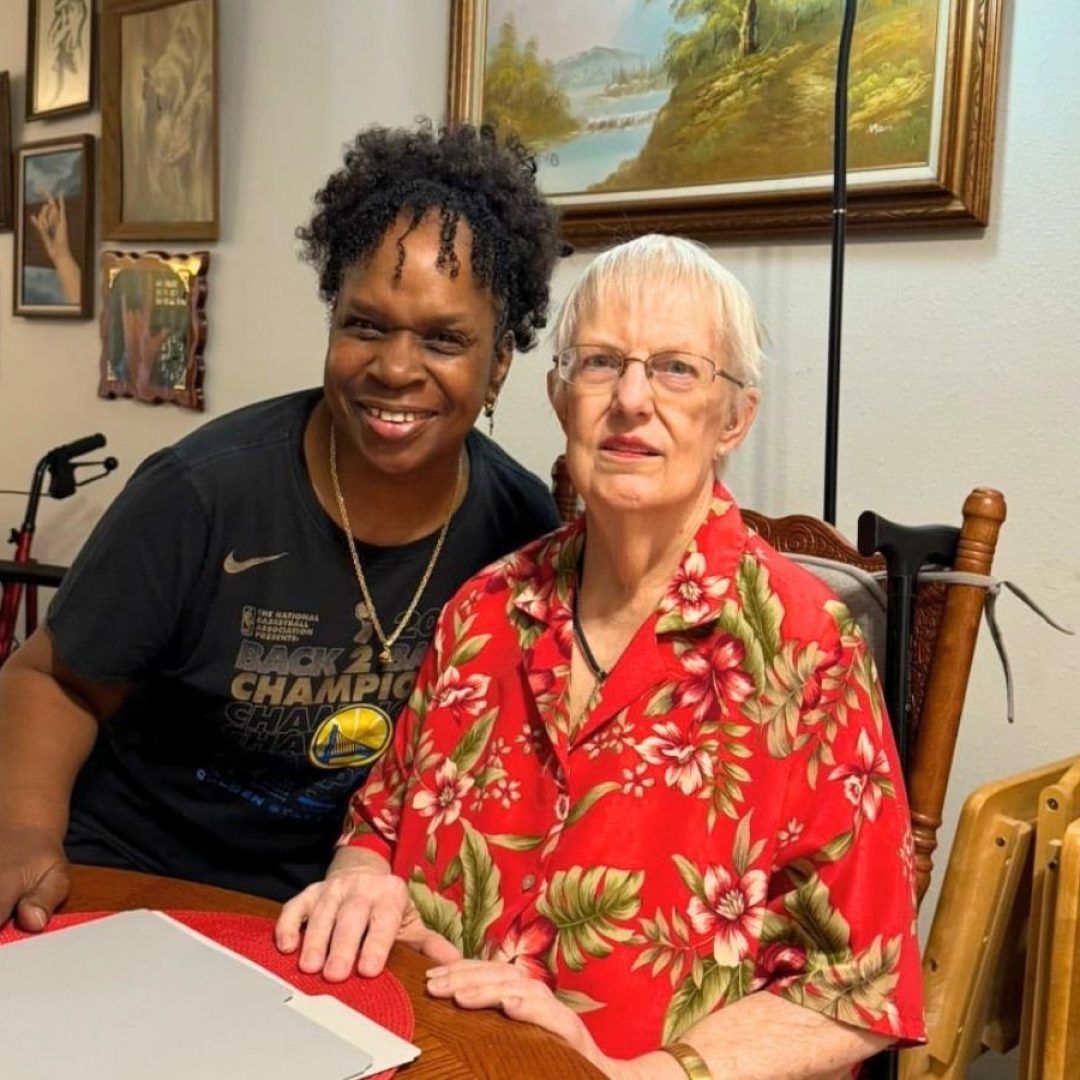 Senior Companion volunteer Cynthia visits with Barbara, providing friendship, companionship, and support in her home.