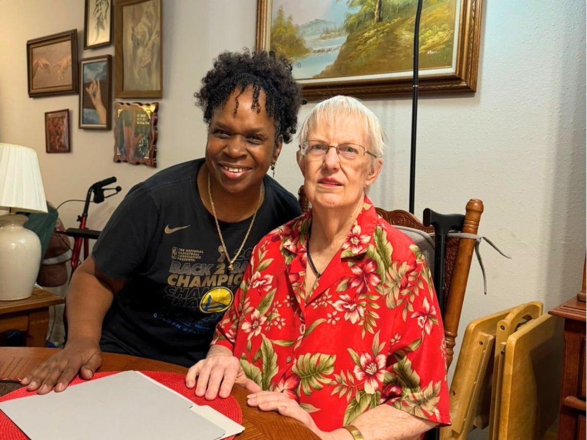 Senior Companion volunteer Cynthia visits with Barbara, providing friendship, companionship, and support in her home.