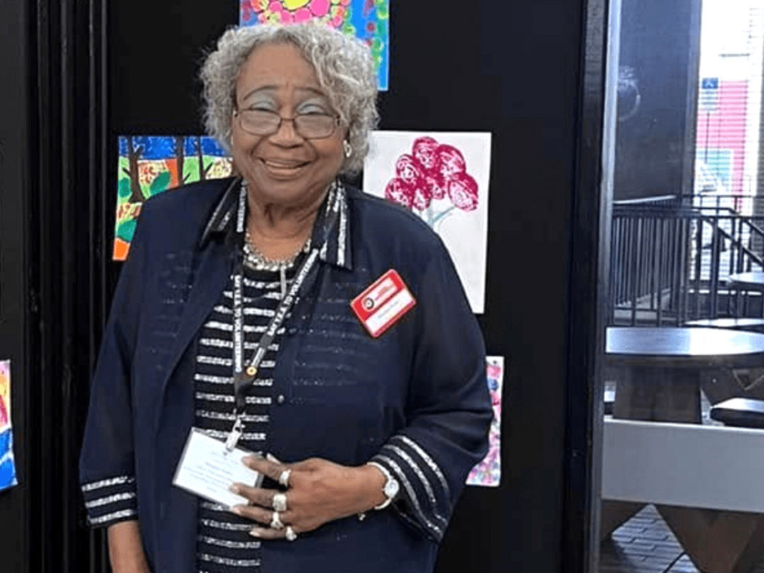 Classroom Grandparent Margaret, honored as a Hillsborough County Public Schools Volunteer of the Year, smiles while serving at Colson Elementary School.