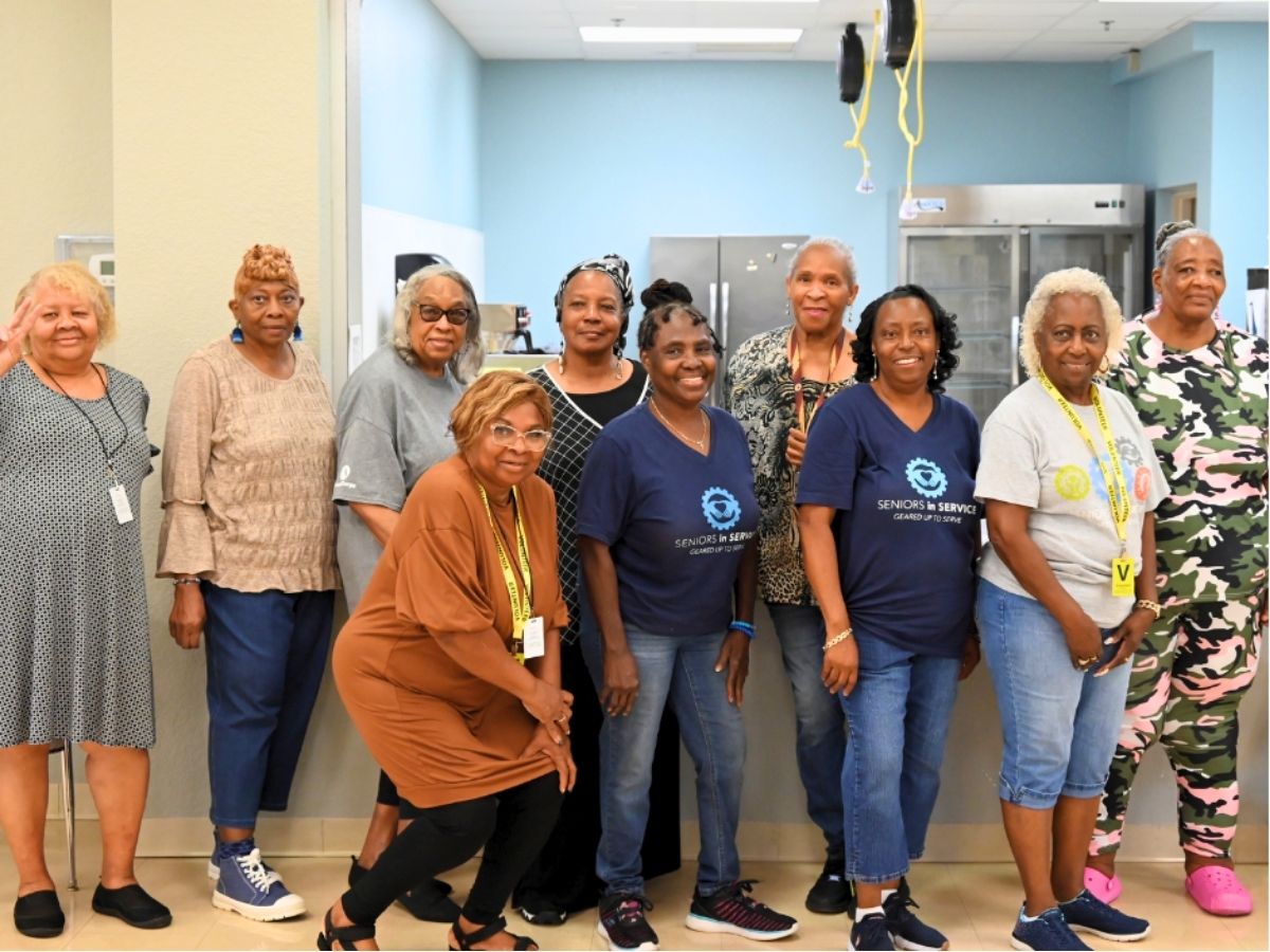 Classroom Grandparent volunteers gather at a community event supporting students and families in Tampa Bay.
