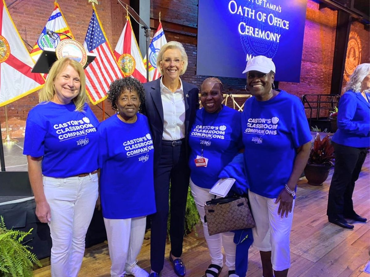 Classroom Grandparent volunteers pose with Mayor Jane Castor during the City of Tampa Oath of Office Ceremony.