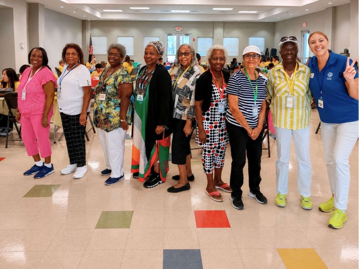 Classroom Grandparent volunteers participate in Youth STEAM Day at The Lealman Exchange, helping inspire students through hands-on learning activities.