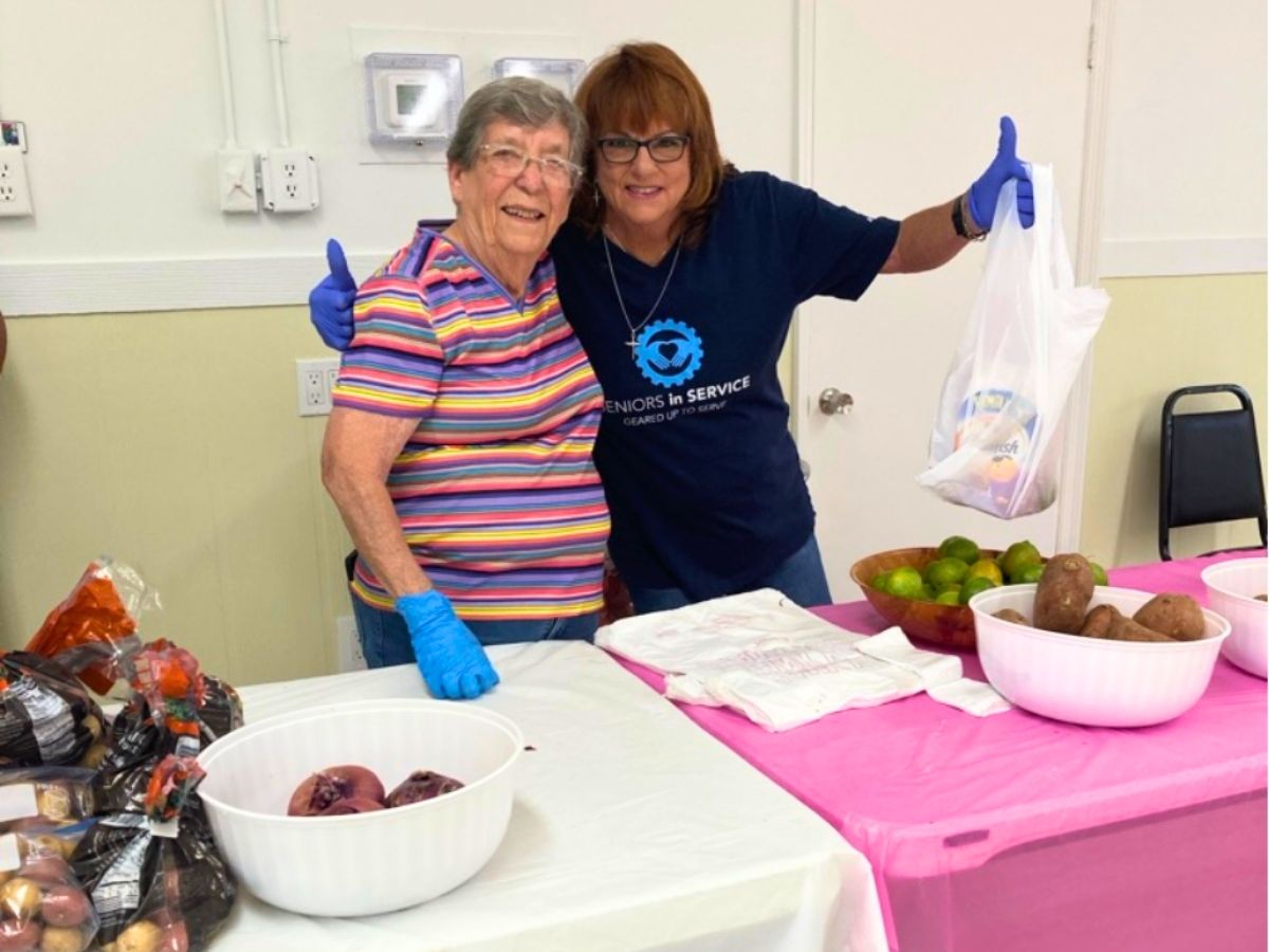 RSVP volunteers pack fresh food bags for families at Grace's Food Pantry in Pasco County.