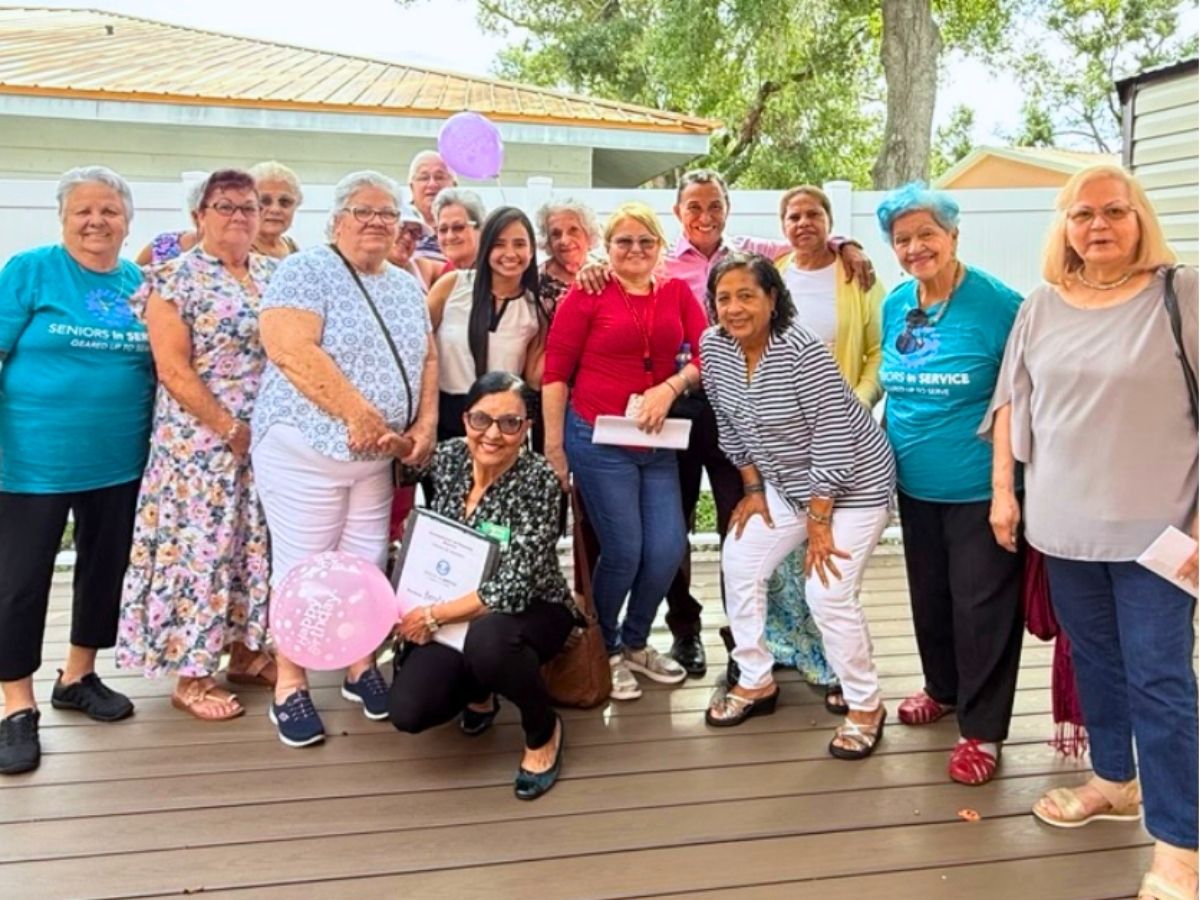 Senior Companion volunteers gather to celebrate Hispanic Heritage Month with food, friendship, and community.