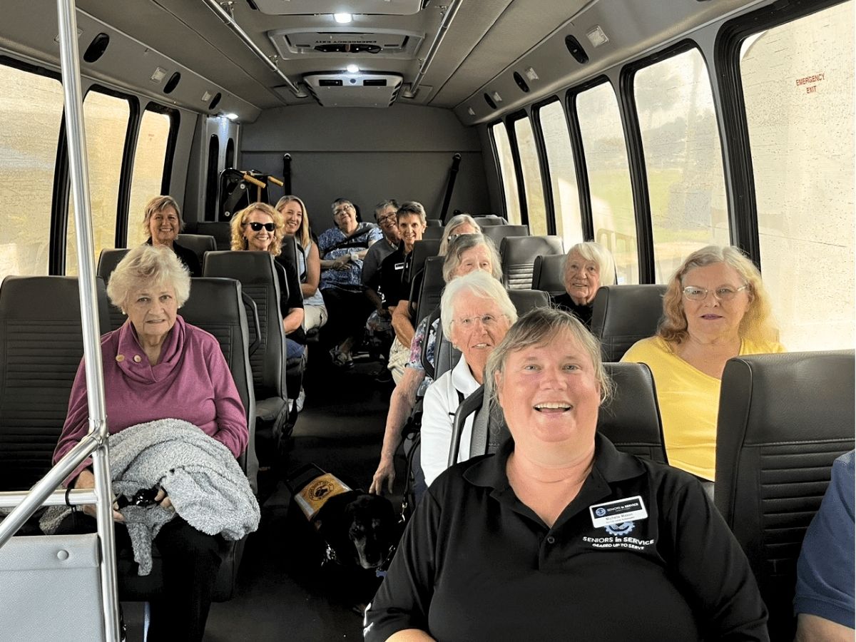Members of the Seniors in Service Low Vision Support Group travel together by accessible shuttle to Lighthouse for the Blind to explore adaptive technology and vision support resources.