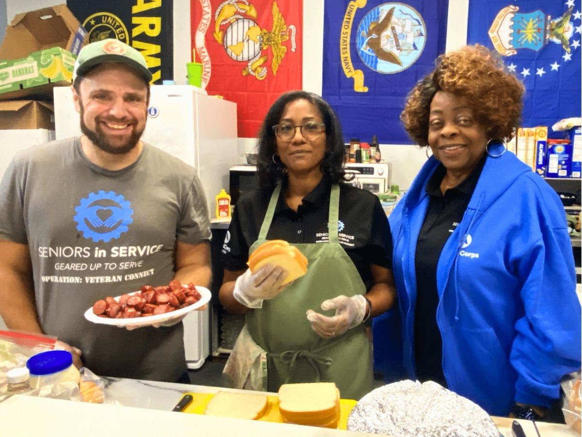 Operation: Veteran Connect volunteers prepare budget-friendly meals during a cooking class that teaches veterans easy, affordable recipes.
