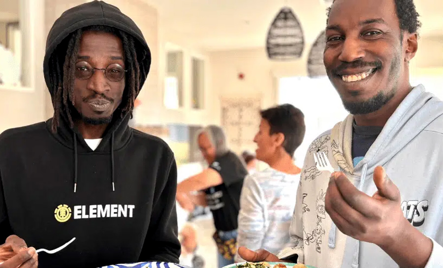 Two veterans enjoy a healthy meal during an Operation: Veteran Connect community gathering in Tampa Bay.