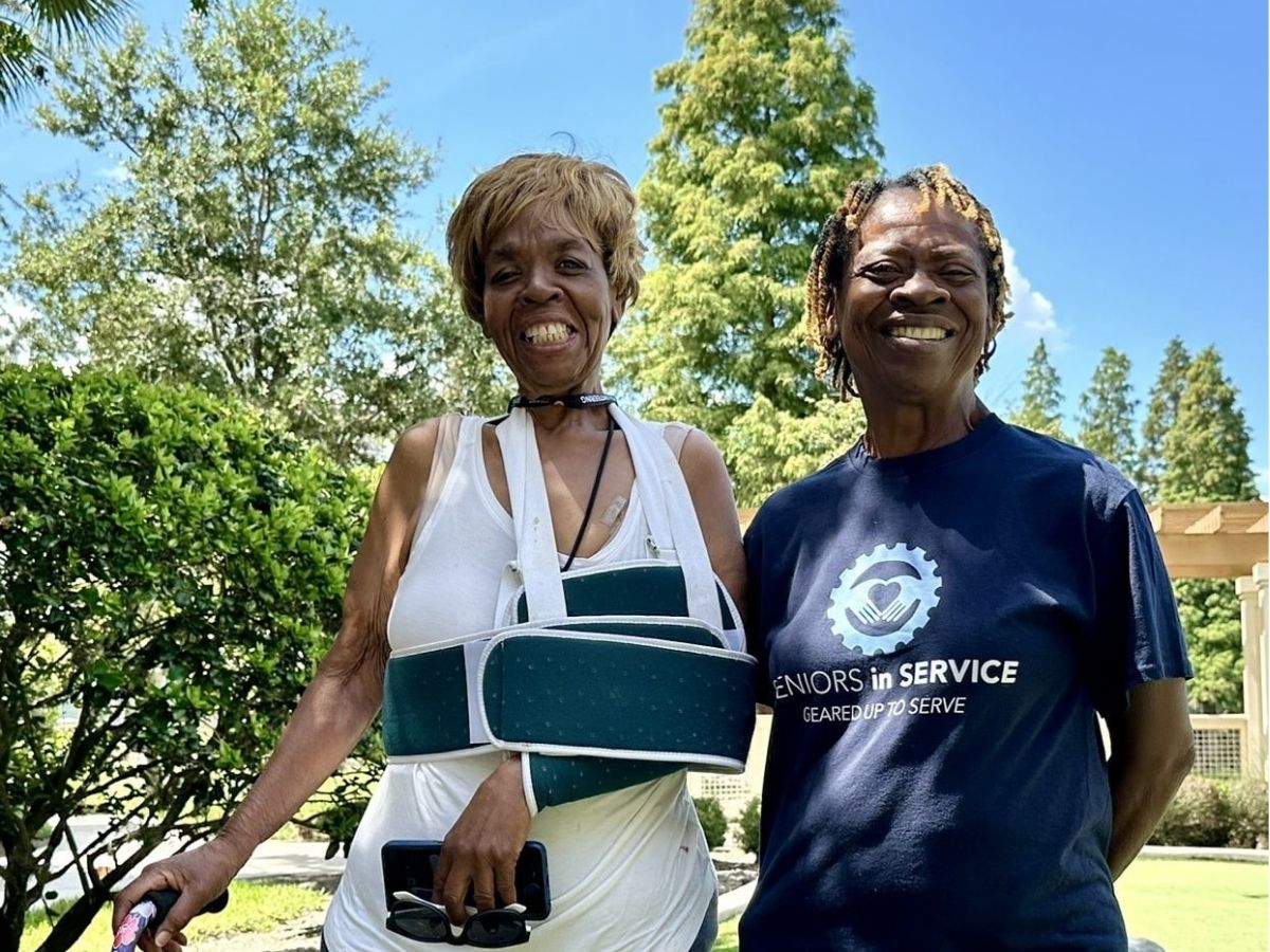 Senior Companion volunteer Frances Hill stands beside Betty Odne during her recovery from surgery in Hillsborough County.