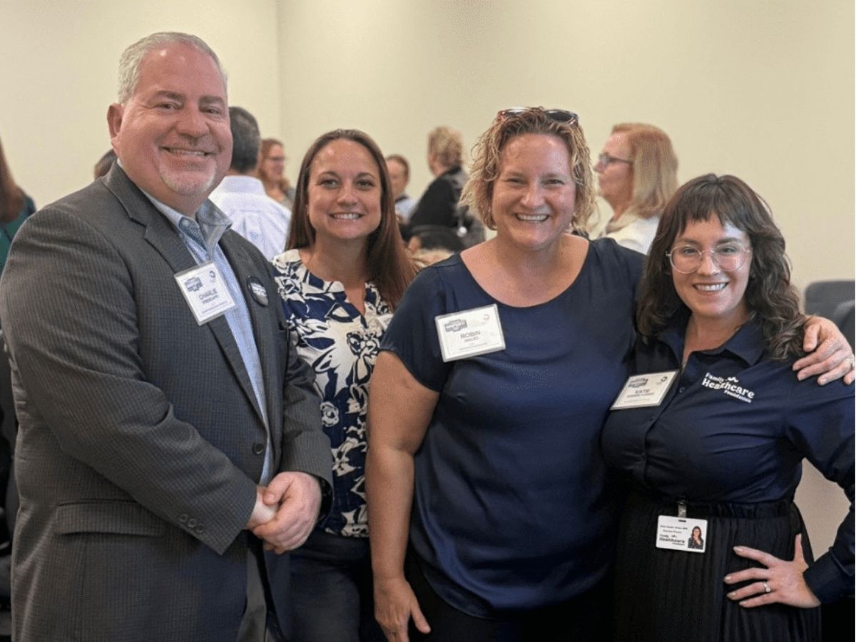 Seniors in Service CEO Robin Ingles with local nonprofit representatives at a training in Tampa Bay.