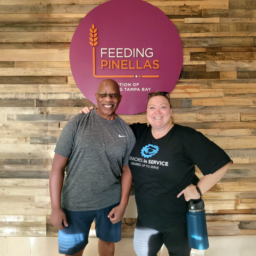 Senior Companion volunteer Herman Archie and Seniors in Service coordinator Sarah Rosenbaum at Feeding Pinellas in Pinellas County.