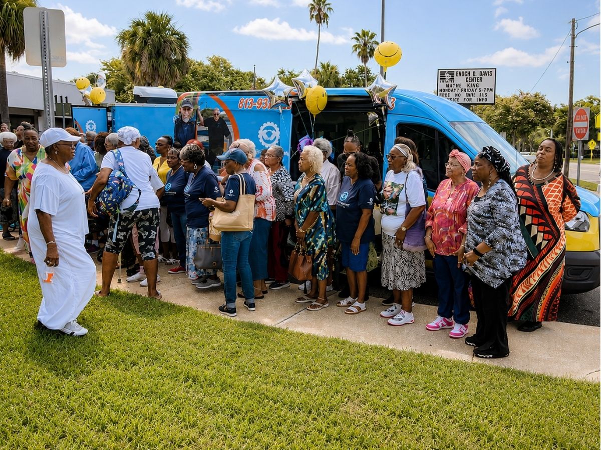 Community members gather around the Seniors in Service Mobile Outreach Unit during a neighborhood outreach event in Pinellas County.