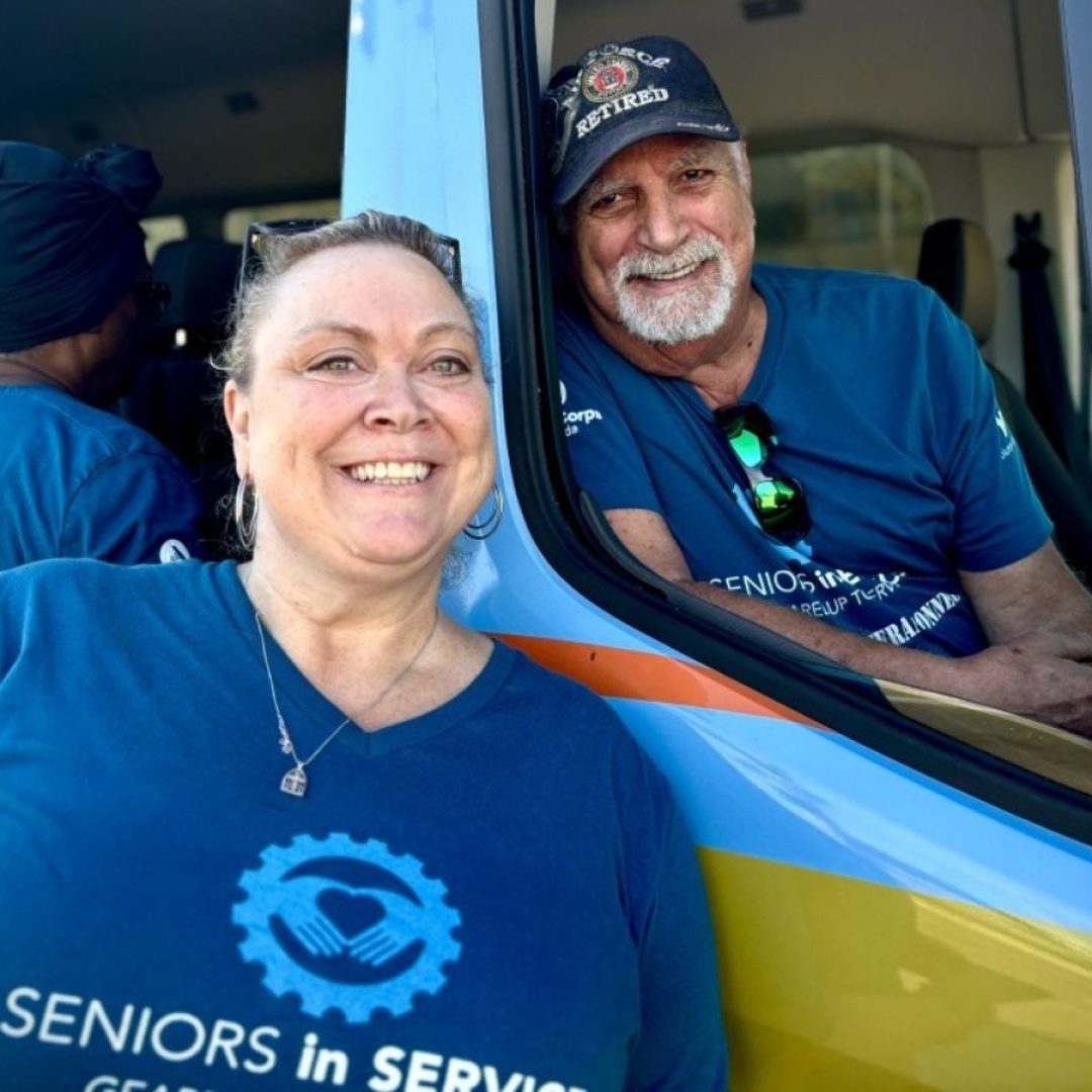 Volunteer driver helps a senior get to an appointment.