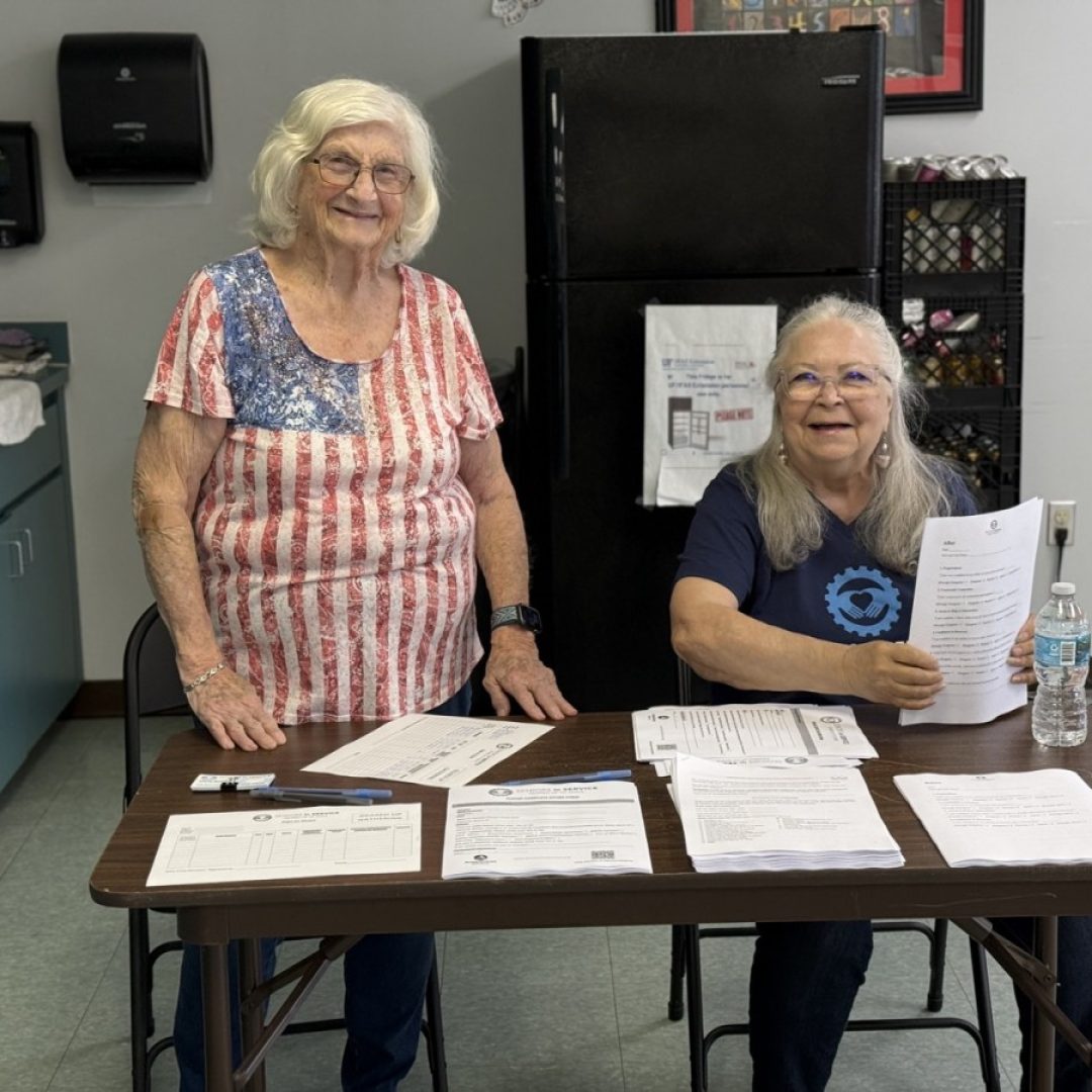 Volunteer leading a social club for older adults in South Shore.