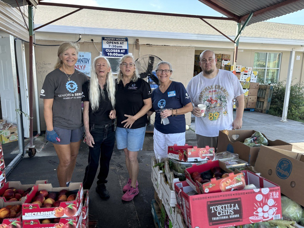 Volunteers distribute fresh food and groceries at a Tampa Bay food pantry supporting residents after Hurricanes Helene and Milton.