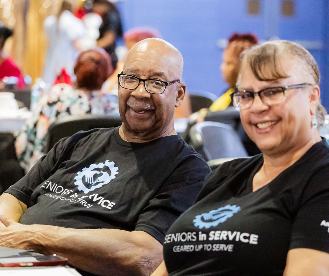 Seniors in Service volunteers pose for a group photo during the "Lucky to Have You" appreciation celebration.