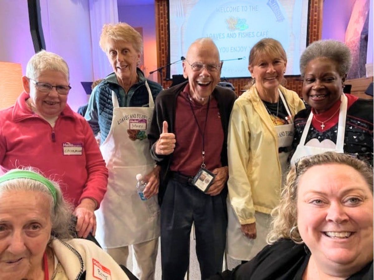 Seniors in Service volunteers serve hot, nutritious meals to community members experiencing homelessness at Christ United Methodist Church in downtown St. Petersburg.