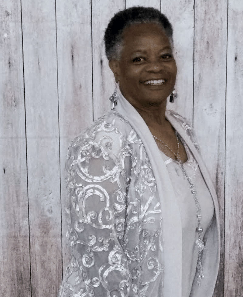 Wiloan "Ms. Peaches" Leaks, a longtime Mercy Keepers volunteer, welcomes guests with a warm smile while serving the St. Petersburg community.